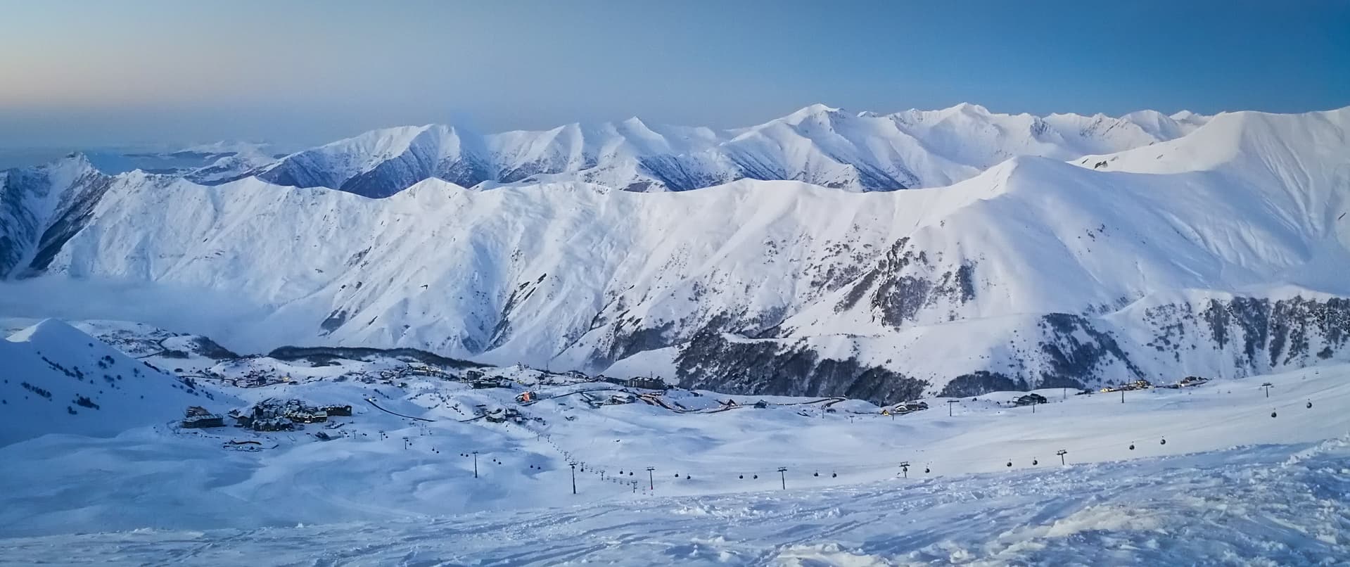 Snow covered slopes above New Gudauri